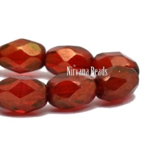 7x5mm Faceted Oval Ruby Red with a Gold Luster